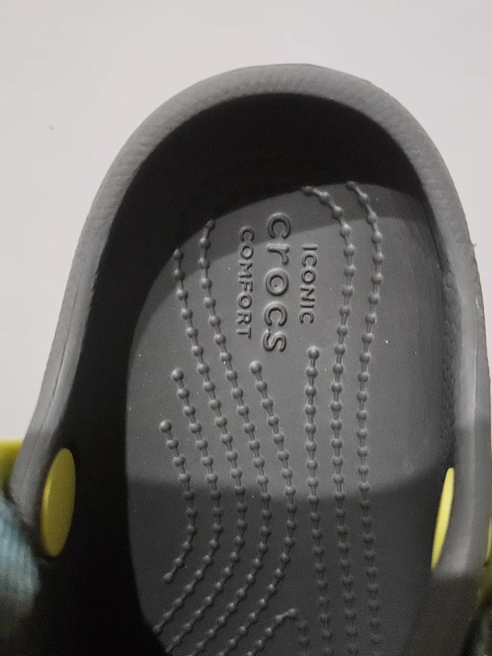 CROCS Kids Gray Clogs with Yellow and Blue Accents